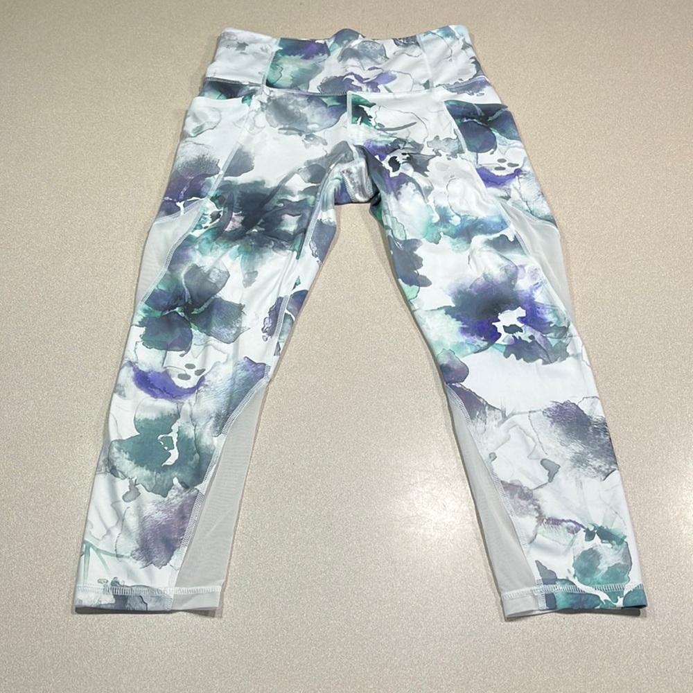 Athleta Floral crop leggings white and purple with sheer netting size S